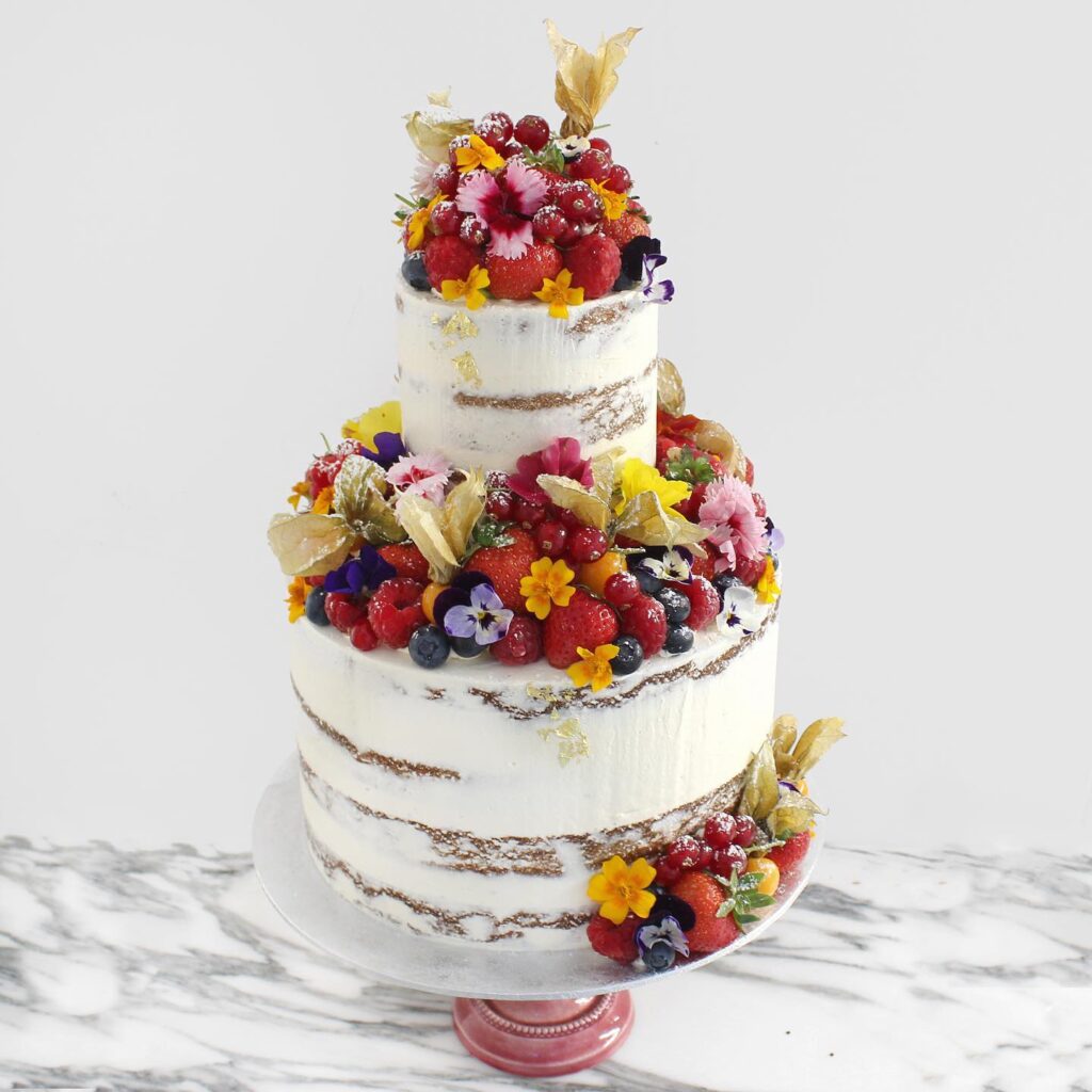 Blueberry Moon Cakes: a photo of a black and white wedding cake. www.blueberrymooncakes.co.uk. Bristol, UK