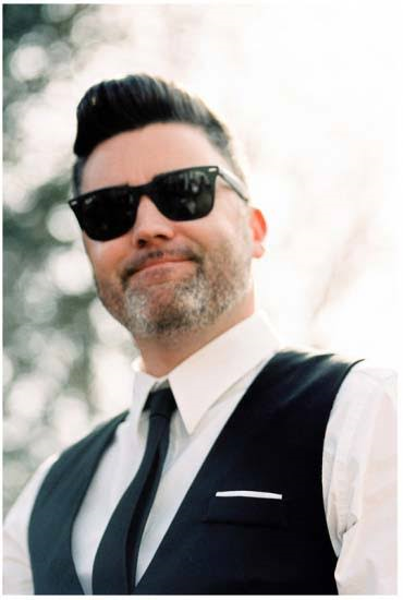 Blueberry Moon Cakes, a photo of a groom with sunglasses on. www.blueberrymooncakes.co.uk. Bristol, UK